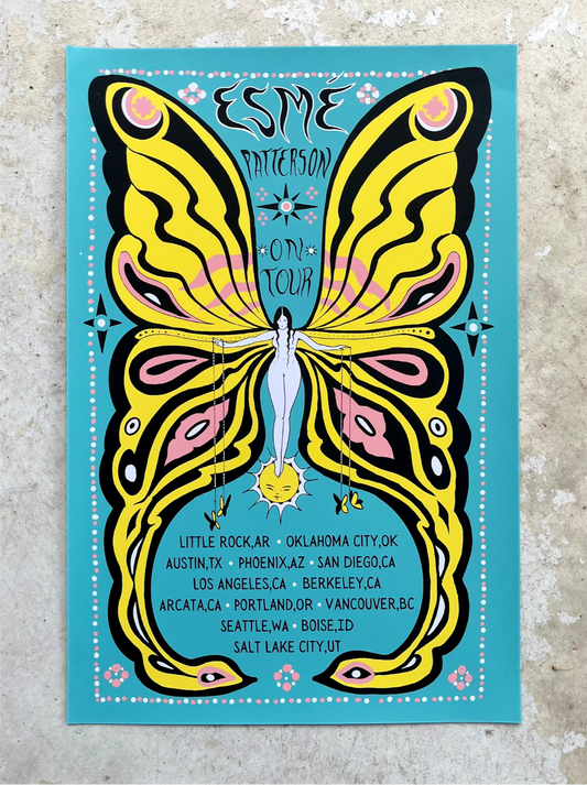 Butterfly-themed concert poster with 'Esme Patterson On Tour' text on a textured surface.
